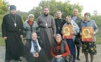 После молебна священномученику Дионисию в селе Чиганак. Настоятель храма в Малиновке священник Сергий Бойко с духовенством окрестных сел и прихожанами. 17 сентября 2012 года После молебна священномученику Дионисию в селе Чиганак. Настоятель храма в Малиновке священник Сергий Бойко с духовенством окрестных сел и прихожанами. 17 сентября 2012 года