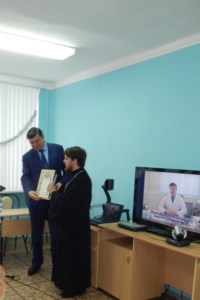 Священник побывал на годовом собрании медиков районной больницы