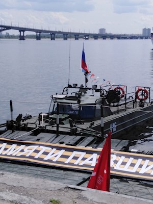 Священник принял участие в торжественной встрече парома с военной техникой